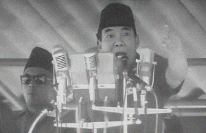 Presiden Soekarno saat berpidato di Jakarta pada 3 Mei 1964 silam, menolak pembentukan negara Federasi Malaysia.